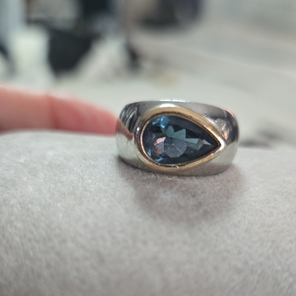 Elegant Silver and Gold Ring with Blue Gemstone